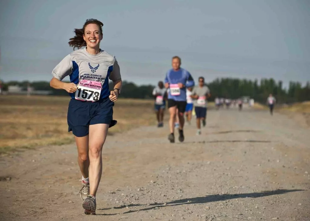 runners on dirt track
