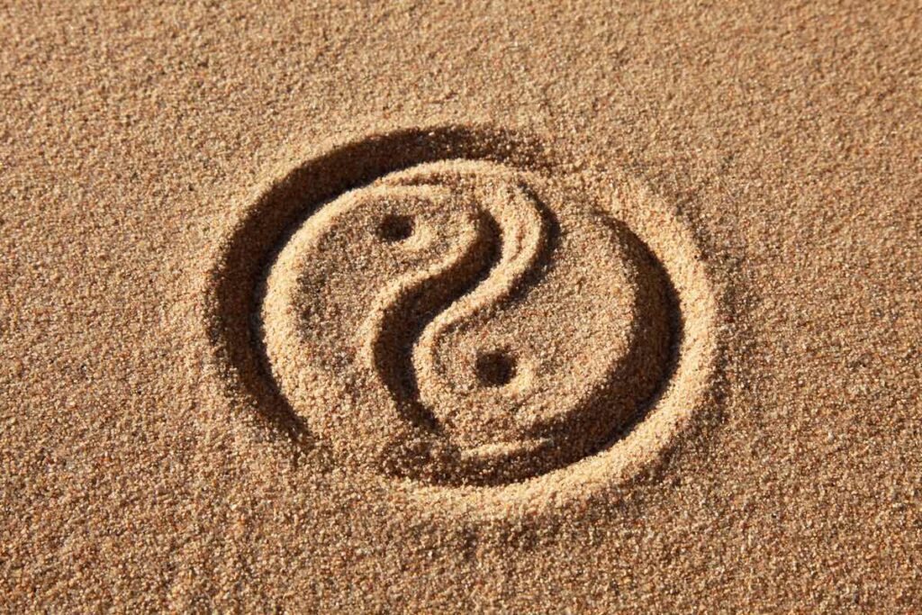 yin yang in the sand