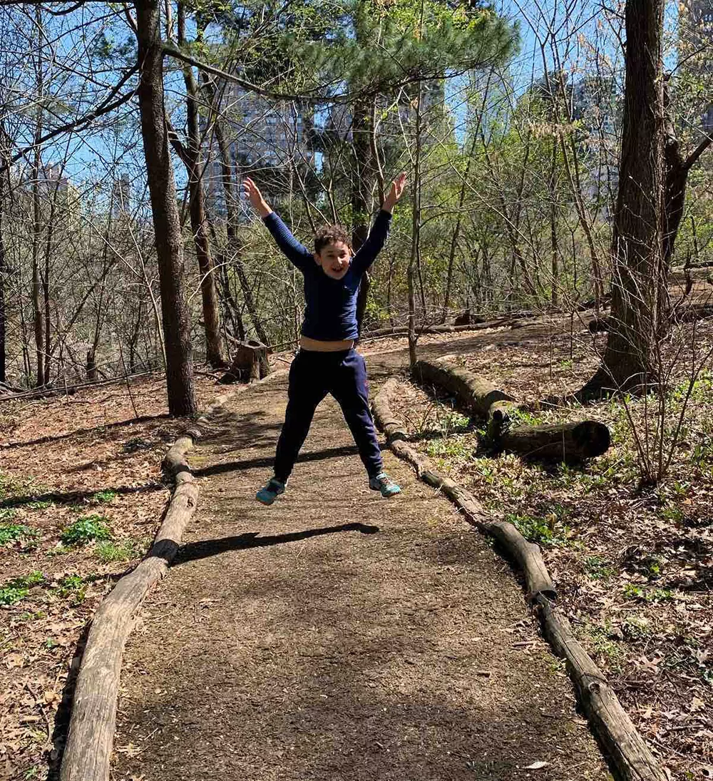 Child jumping in park