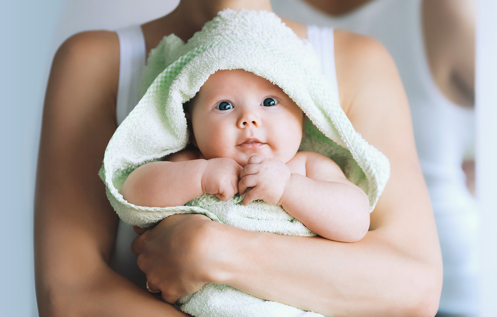 baby wrapped in a towel