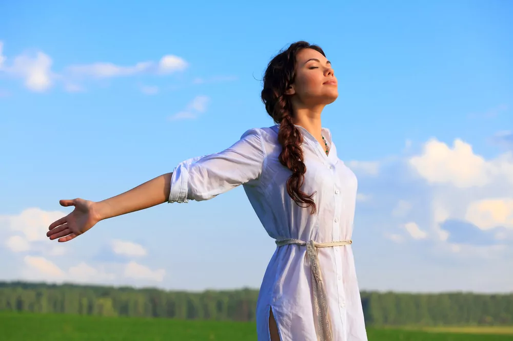 woman enjoying sunshine woman enjoying sunshine