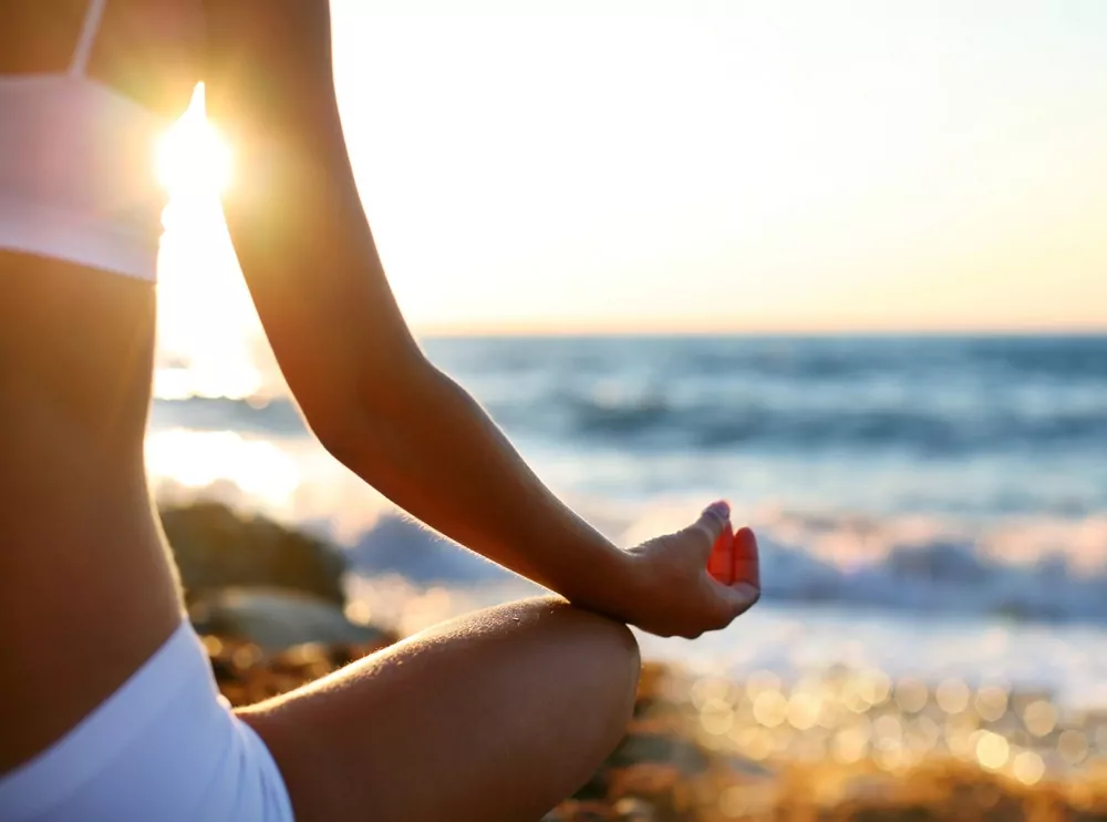 meditating on beach